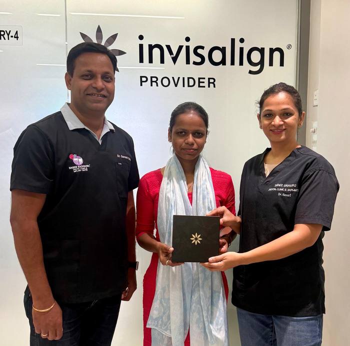 A milestone moment, celebrated with the clinic team